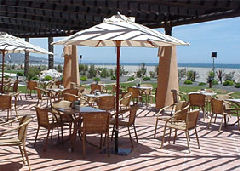 Tables and Chairs in the Outdoor Dining Area, Valle del Este Beach 	Club